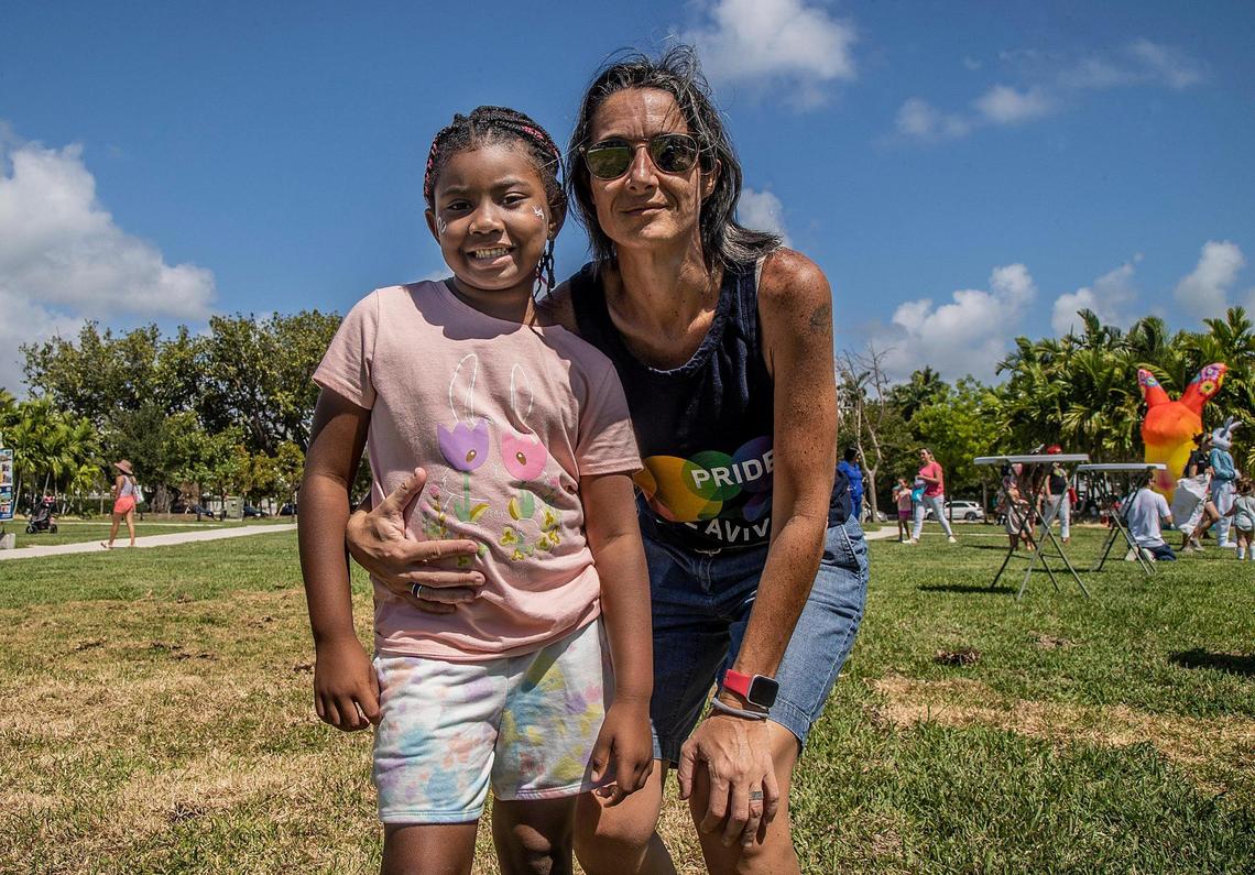 Cecile Houry with her daughter Lila Houry, enjoy the outdoors at the Easter Family Picnic celebration part of the Miami Beach Pride Festival at Pride Park, on Saturday April 8, 2023.