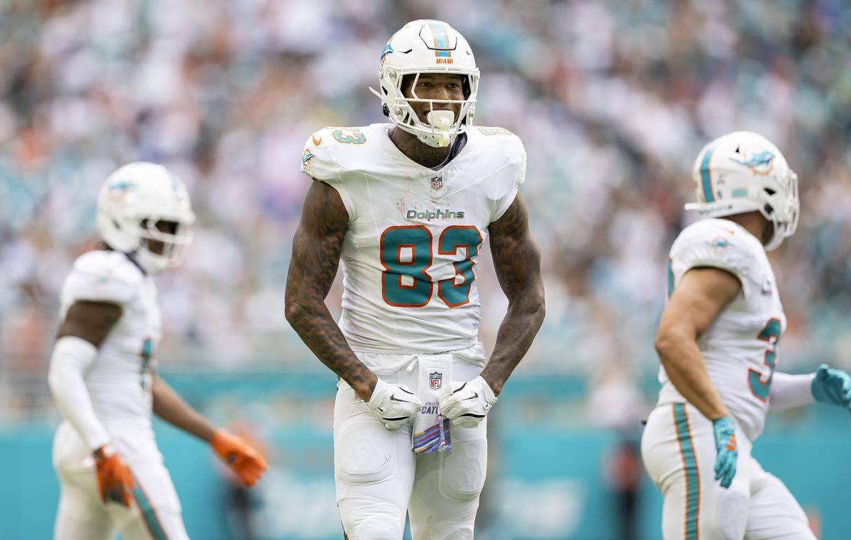 Miami Dolphins tight end Darren Waller (83) reacts after a play against the Los Angeles Chargers in the first half of their NFL game at Hard Rock Stadium on Sunday, Oct. 12, 2025, in Miami Gardens, Fla.