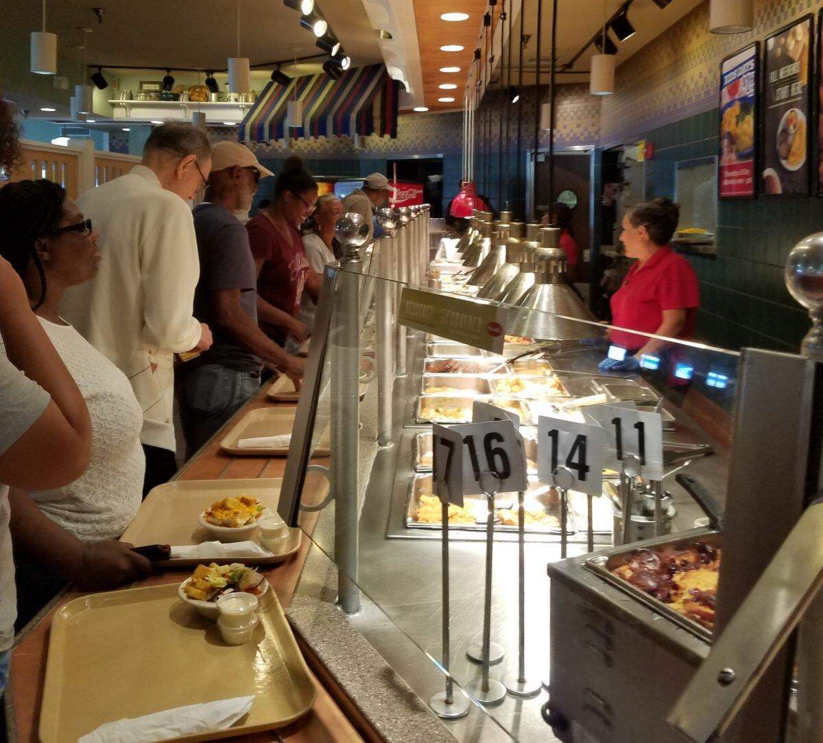 Customers line up for entrees at lunchtime at the Hollywood Piccadilly in this file photo from June 16, 2018.