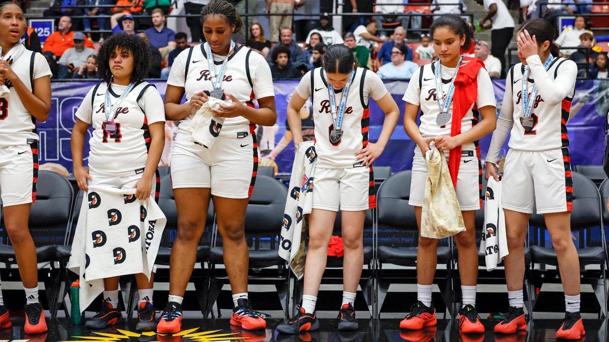Southridge Spartans’ Emily Jean-Glaude (3), Joann Barnes (14), Zharianna Guion (33), Naya Hardisson (0), Sakura Barnes (1), and Dianka Hardisson (2). left to right, react after being defeated by Bloomingdale for the FHSAA Class 6A Girls High School Basketball State Championship at the RP Funding Center in Lakeland, Florida on Saturday, March 8, 2025.