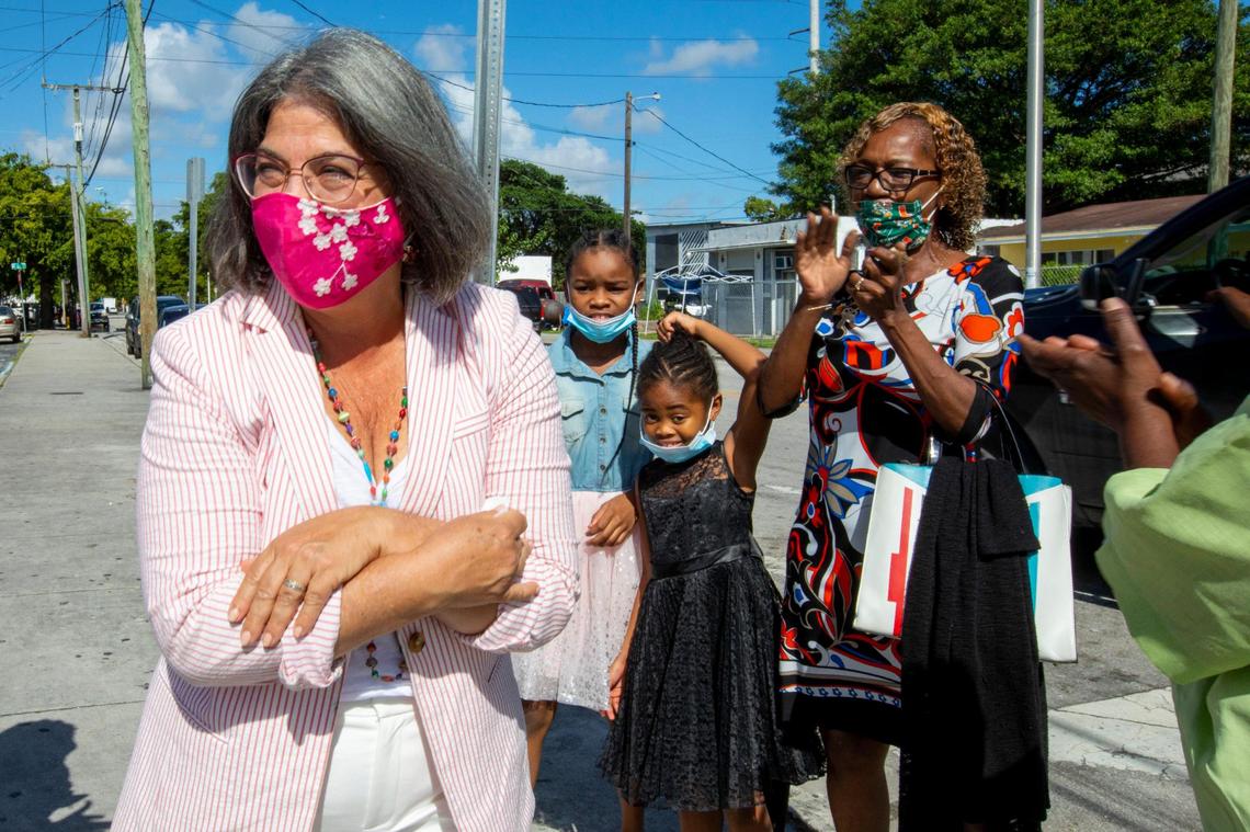 County Mayor-elect Daniella Levine Cava speaks with constituents near a mural designed in her honor as she stops in the Liberty City neighborhood of Miami on a tour of Miami-Dade on Sunday, Nov. 15, 2020. Levine Cava becomes Miami-Dade’s first woman mayor on Tuesday, Nov. 17.