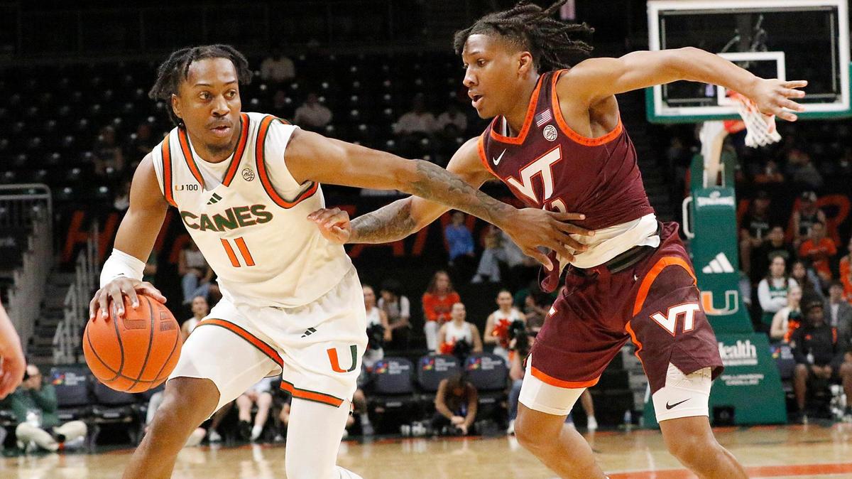 UM Hurricanes AJ Staton-McCray (11) dribbles against Virginia Tech Hokies during the NCAA men’s basketball game on Saturday, February 22, 2025 at Watsco Center in Coral Gables. Andrew Uloza / for Miami Herald
