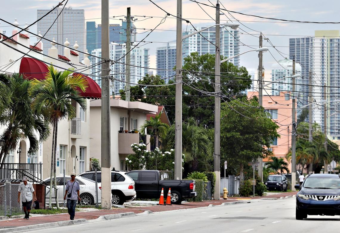 Brickell high-rises loom over the east side of Little Havana, one of the neighborhoods expected to undergo rapid gentrification in the next five years.