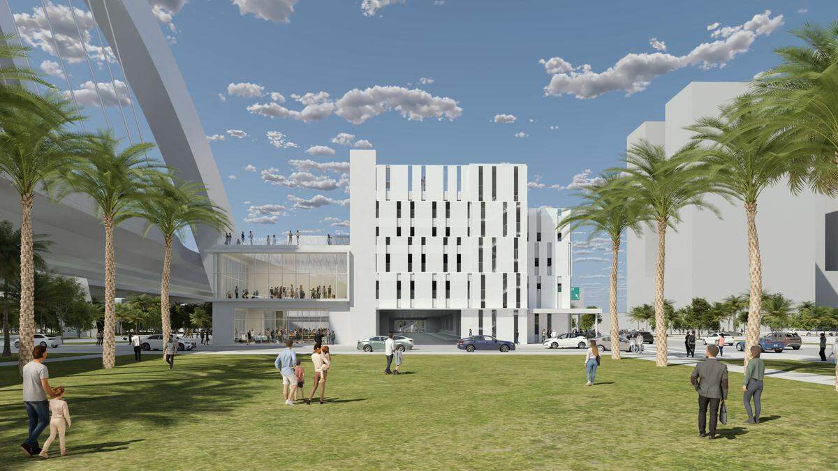 Un boceto muestra el posible aspecto de la entrada de un estacionamiento proyectado para el Arsht Center for the Performing Arts, situado entre el nuevo tramo de la Interestatal 395 en dirección oeste -actualmente en construcción- y la Northeast Second Avenue. En el lado izquierdo del edificio del estacionamiento se aprecia un espacio de estudio acristalado, también previsto en el proyecto.