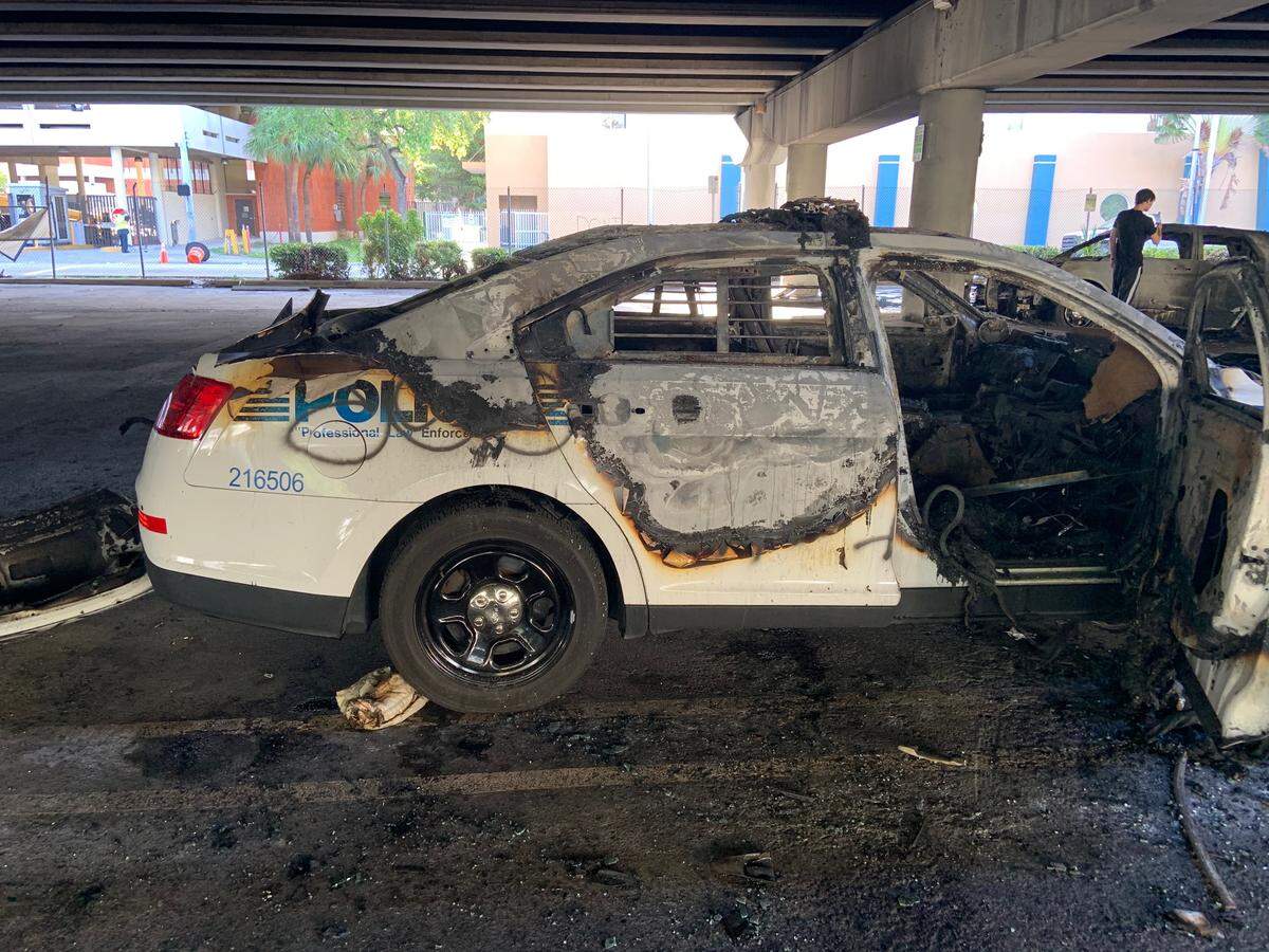 Miami police say a total of 17 squad cars were damaged during the protests on May 30, ranging from punctured tires, broken windows and burning vehicles.