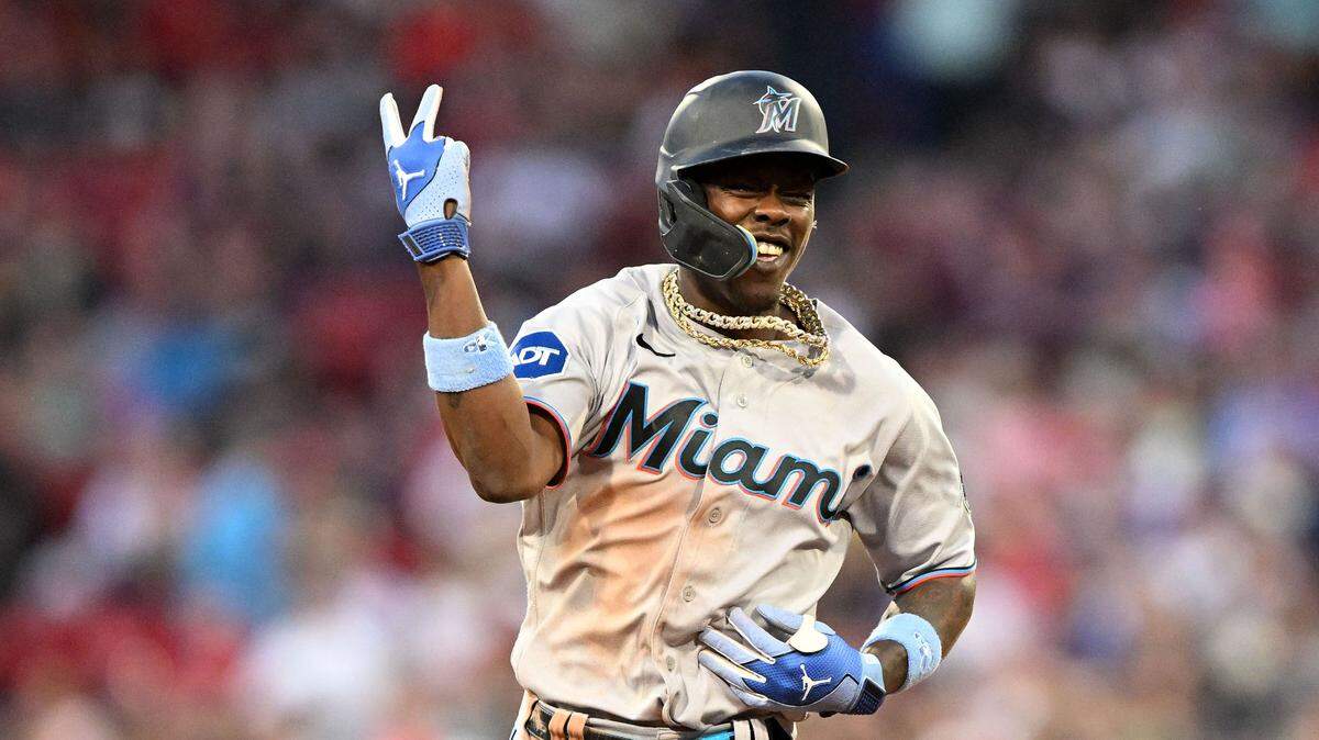 Miami Marlins center fielder Jazz Chisholm Jr. (2) reacts after hitting a home run against the Boston Red Sox during the ninth inning at Fenway Park.