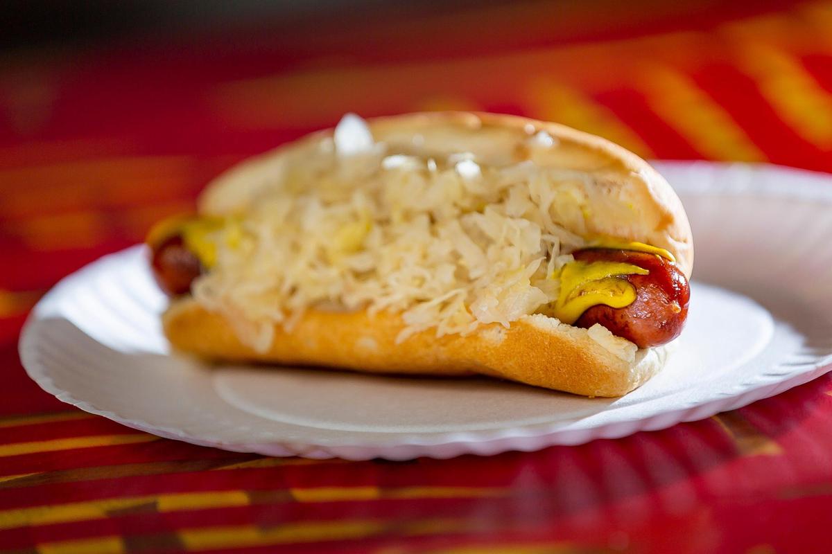 A Sabrett all-beef hot dog with sauerkraut and yellow mustard