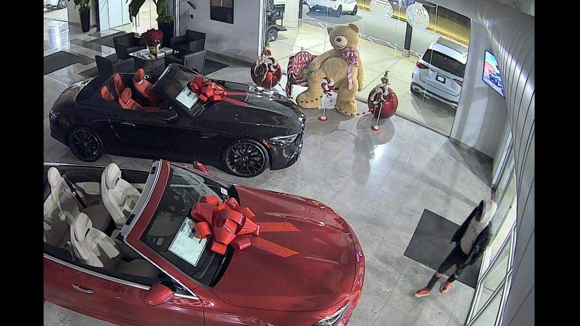 This surveillance video screengrab shows a suspect prowling the Mercedes Benz show room near Atlanta, Gwinnett police say.