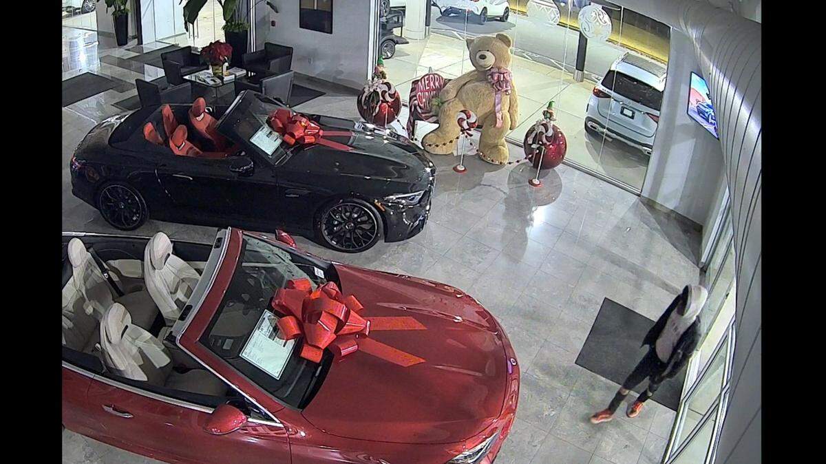 This surveillance video screengrab shows a suspect prowling the Mercedes Benz show room near Atlanta, Gwinnett police say.
