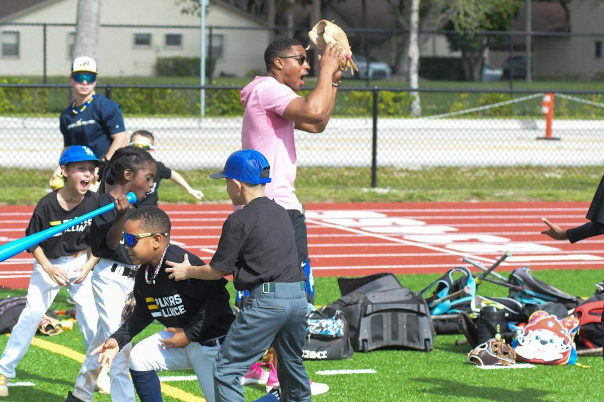 Miami Marlins utility player Xavier Edwards during his sixth-annual baseball skills camp on Saturday, Dec. 23, 2023, at North Broward Preparatory School in Coconut Creek, Florida.