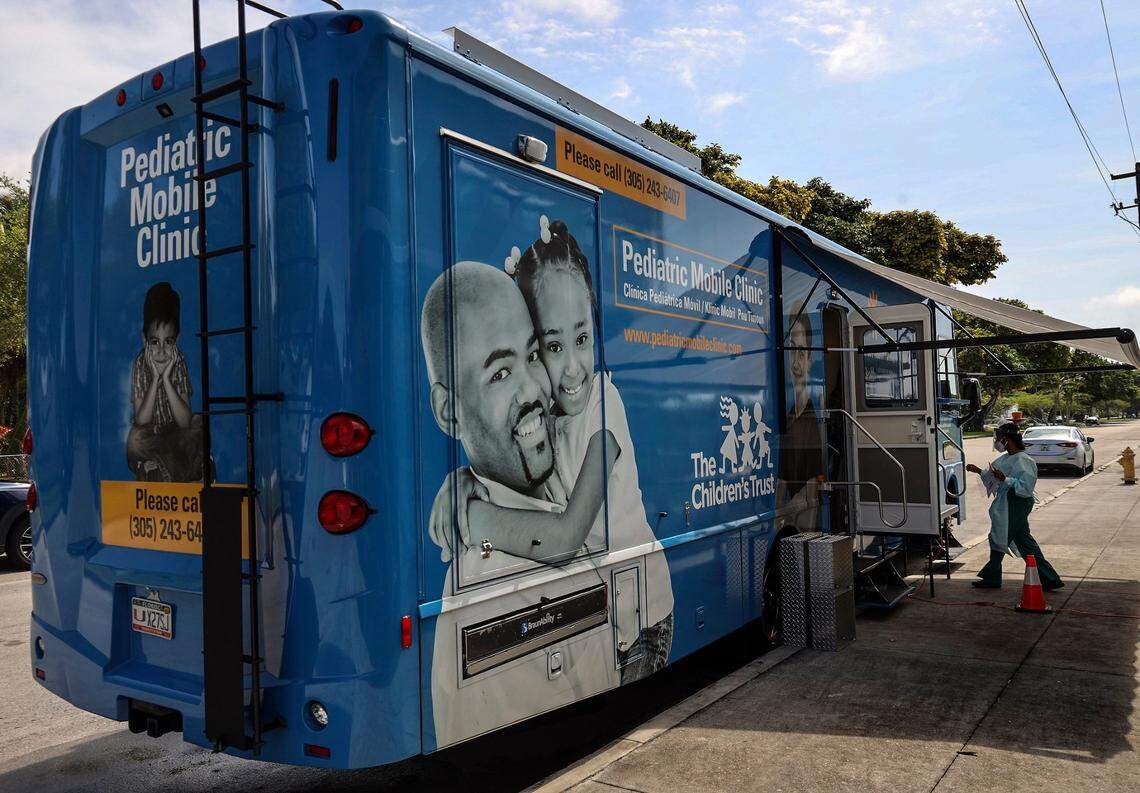 The UHealth mobile clinic parks outside Arch Creek Elementary in North Miami to provide vaccine shots to children as part of the free vaccine drives throughout Miami-Dade County. On Tuesday, May 19, 2020, the University of Miami Health System’s pediatric mobile unit provided free vaccinations throughout Miami-Dade County to help keep children up-to-date in their vaccines during the COVID-19 pandemic.