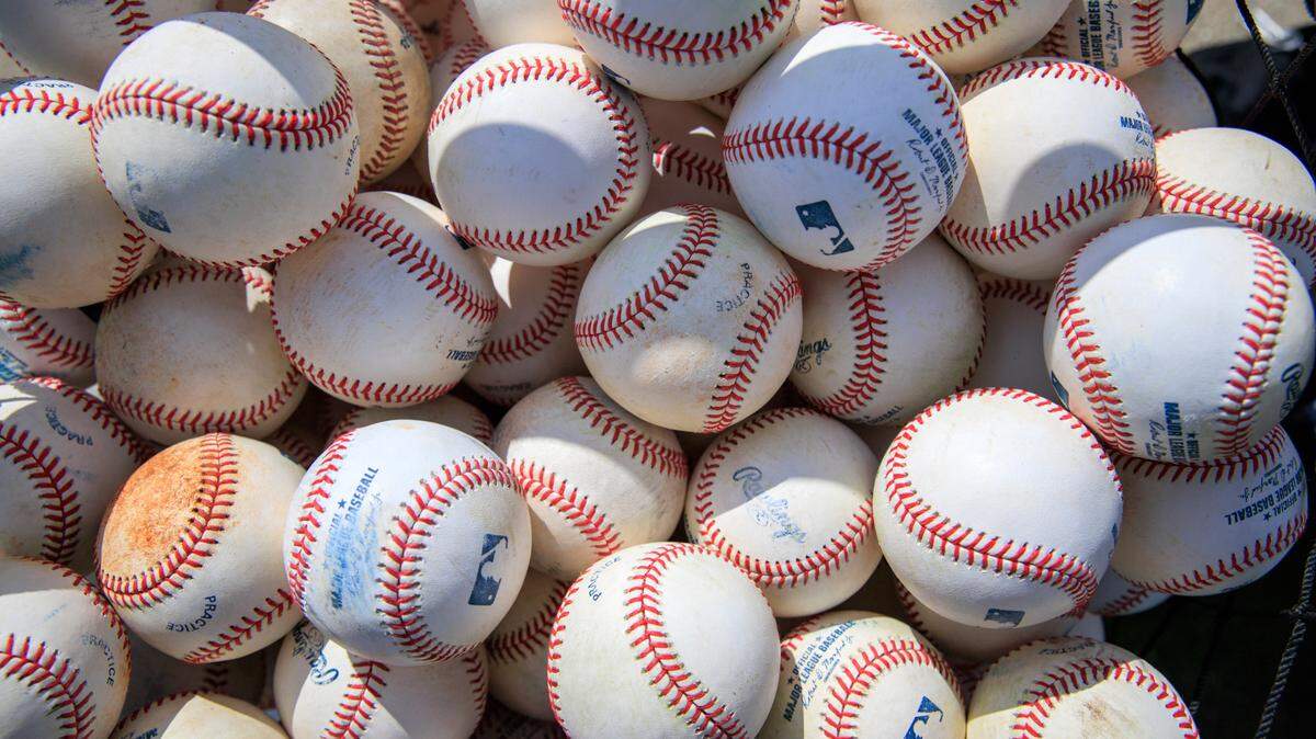 Baseballs are seen in a basket during the Miami Marlins spring training workout at Roger Dean Stadium on Wednesday, March 16, 2022 in Jupiter, FL.