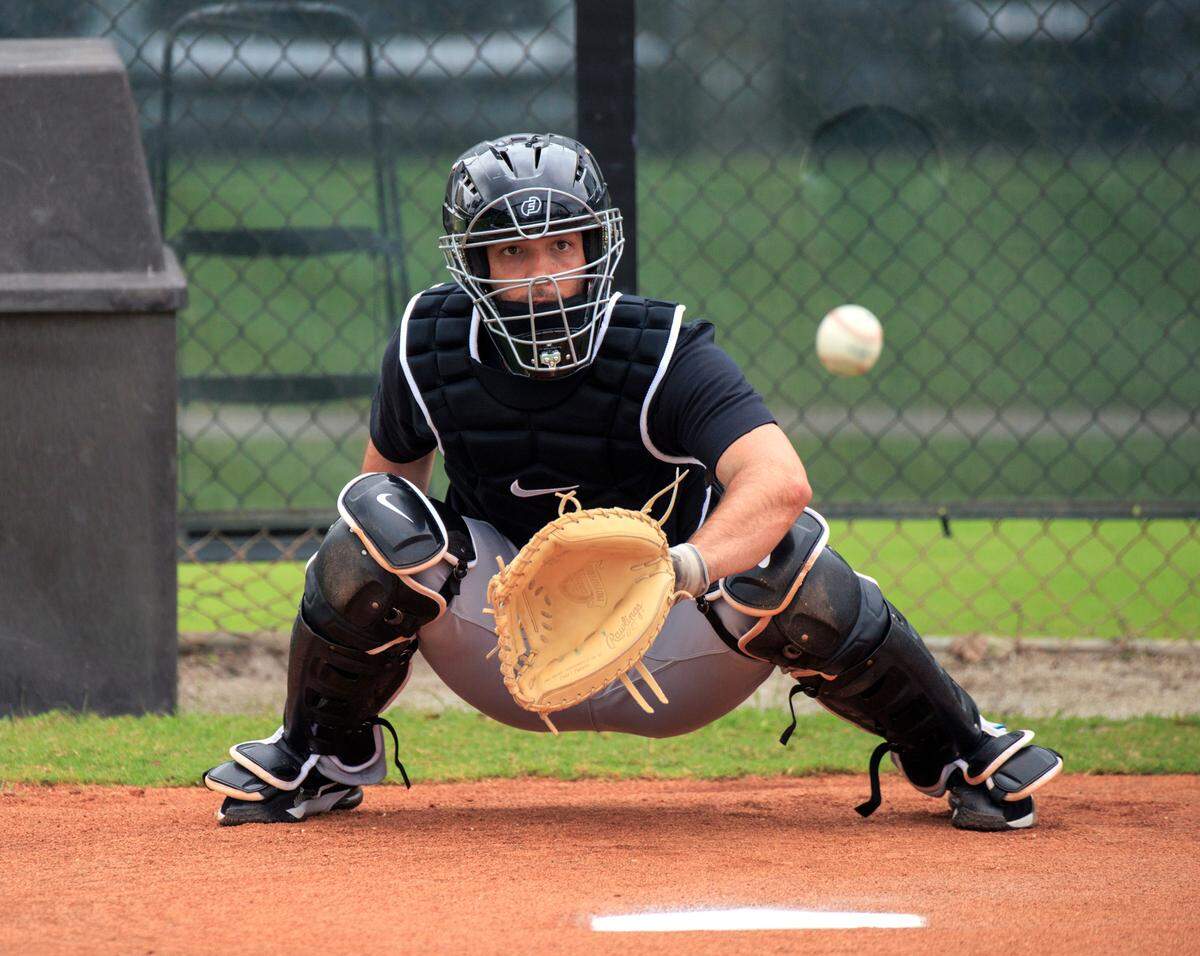 Miami Marlins catcher Jacob Stallings runs drills during their spring training workout at Roger Dean Stadium on Tuesday, March 15, 2022 in Jupiter, FL.