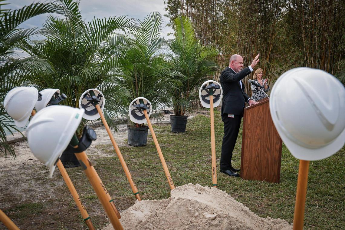Roy Coley, director of the Miami-Dade Water and Sewer Department, center, greets attendees for the groundbreaking of the Connect 2 Project. On Thursday, Jan. 27, 2022, Miami-Dade County Mayor Daniella Levine Cava launched Connect 2 Protect, a multi-year, countywide program to help provide sewer service to residents with septic tank systems. It kicked off just north of Miami’s Shorecrest neighborhood.