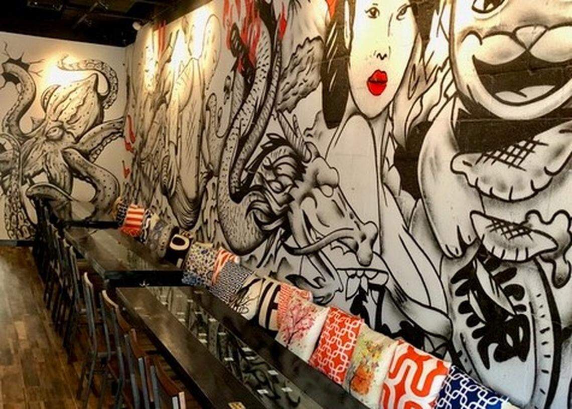 A mural by local artist Ivan Roque.