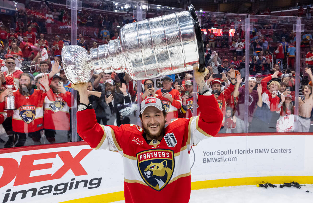 Florida Panthers defenseman Brandon Montour (62) lifts the Stanley Cup after defeating the Edmonton Oilers in Game 7 of the Stanley Cup Final at Amerant Bank Arena on Monday, June 24, 2024, in Sunrise, Fla.