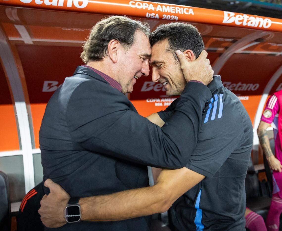 Argentina head coach Lionel Scaloni hugs Colombia head coach Néstor Lorenzo before the start of their Copa America 2024 Final soccer match at Hard Rock Stadium on Sunday, July 14, 2024, in Miami Gardens, Fla.