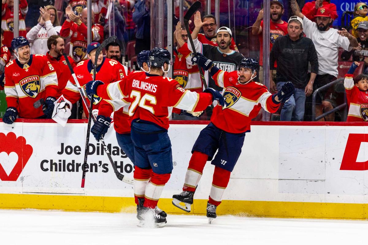 Florida Panthers right wing Brad Marchand (63) reacts with teammates Uvis Balinskis (26) and Gustav Forsling (42) after scoring on Detroit Red Wings goaltender Cam Talbot (39) during the second period of an NHL game at Amerant Bank Arena on Thursday, April 10, 2025, in Sunrise, Fla.