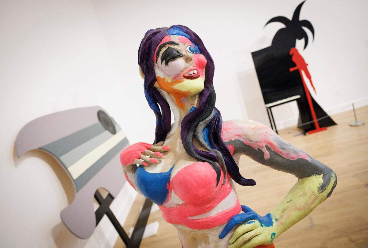 “Feathers”, a sculpture by Rachel Feinstein inspired by Victoria’s Secret models wearing feathers in shows and is a nod to the plastic surgery that is prevalent in Miami.
