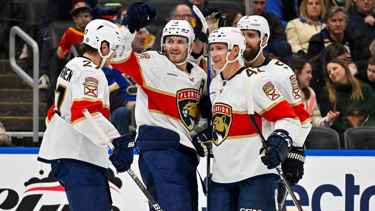 Jan 9, 2024; St. Louis, Missouri, USA; Florida Panthers left wing Matthew Tkachuk (19) celebrates with center Eetu Luostarinen (27) defenseman Gustav Forsling (42) and defenseman Aaron Ekblad (5) after scoring his second goal of the game against the St. Louis Blues during the third period at Enterprise Center.