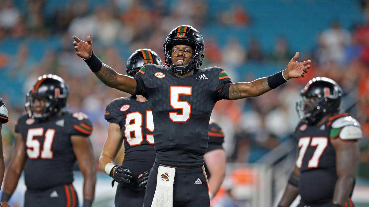 Miami Hurricanes quarterback N’Kosi Perry, shown in the North Carolina game, will be wearing all-black with his teammates for the second time this season on Saturday at Georgia Tech.