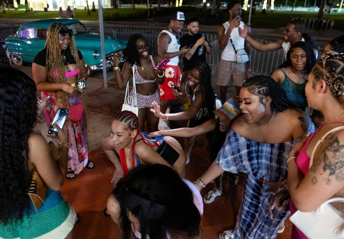 A group of women dance on Ocean Drive during spring break on Friday, March 15, 2024, in Miami Beach.&nbsp;