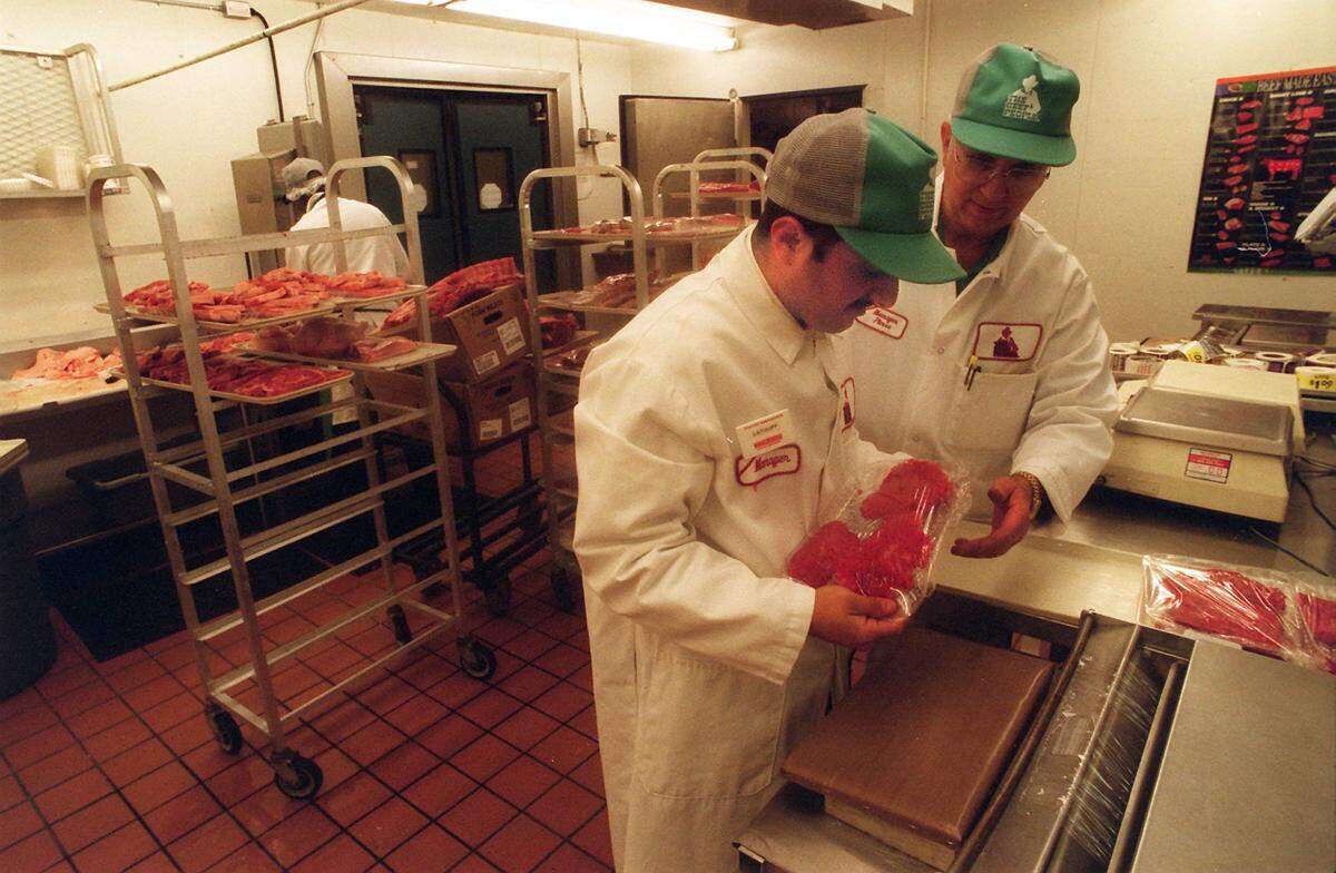 Workers at the Winn-Dixie meat department.