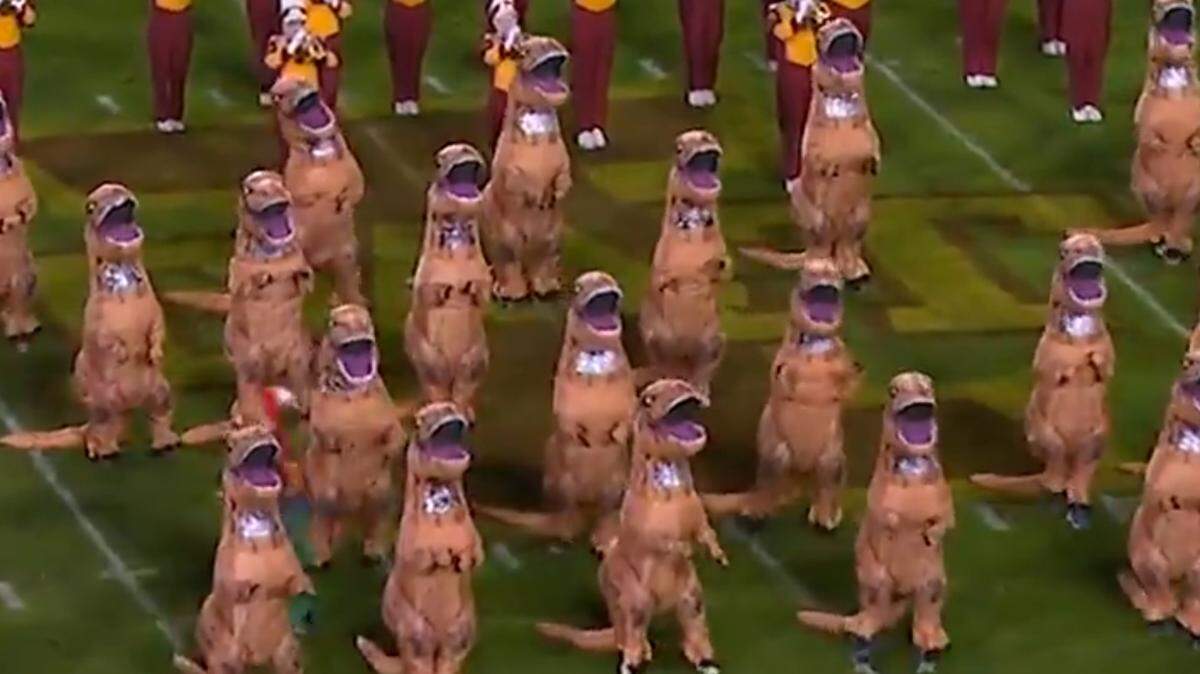 Iowa State’s halftime show had its band play the Jurassic Park theme song with dancing dinosaurs.
