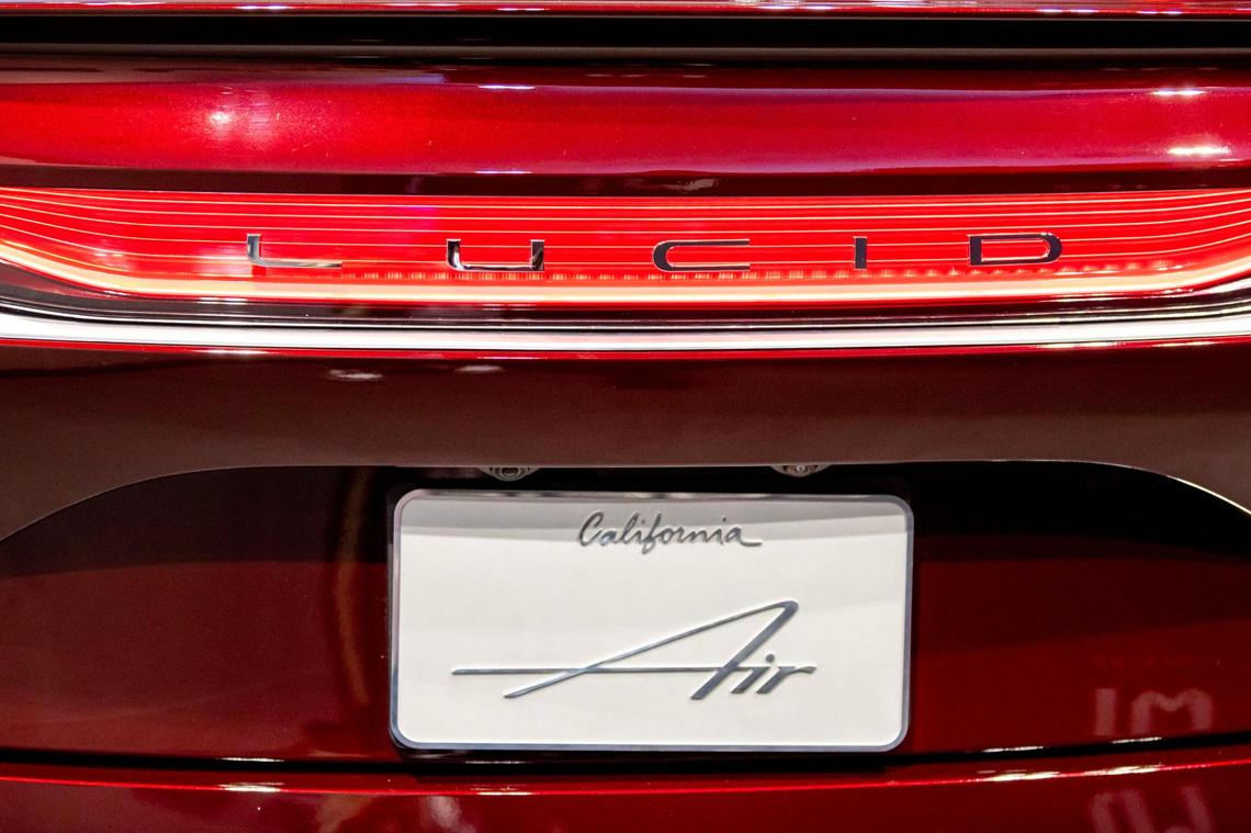 A rear view of a Lucid Air Grand Touring model at the Brickell Studio showroom for Lucid, a new high-end electric car company, within Brickell City Centre in Miami, Florida, on Friday, December 2, 2022.
