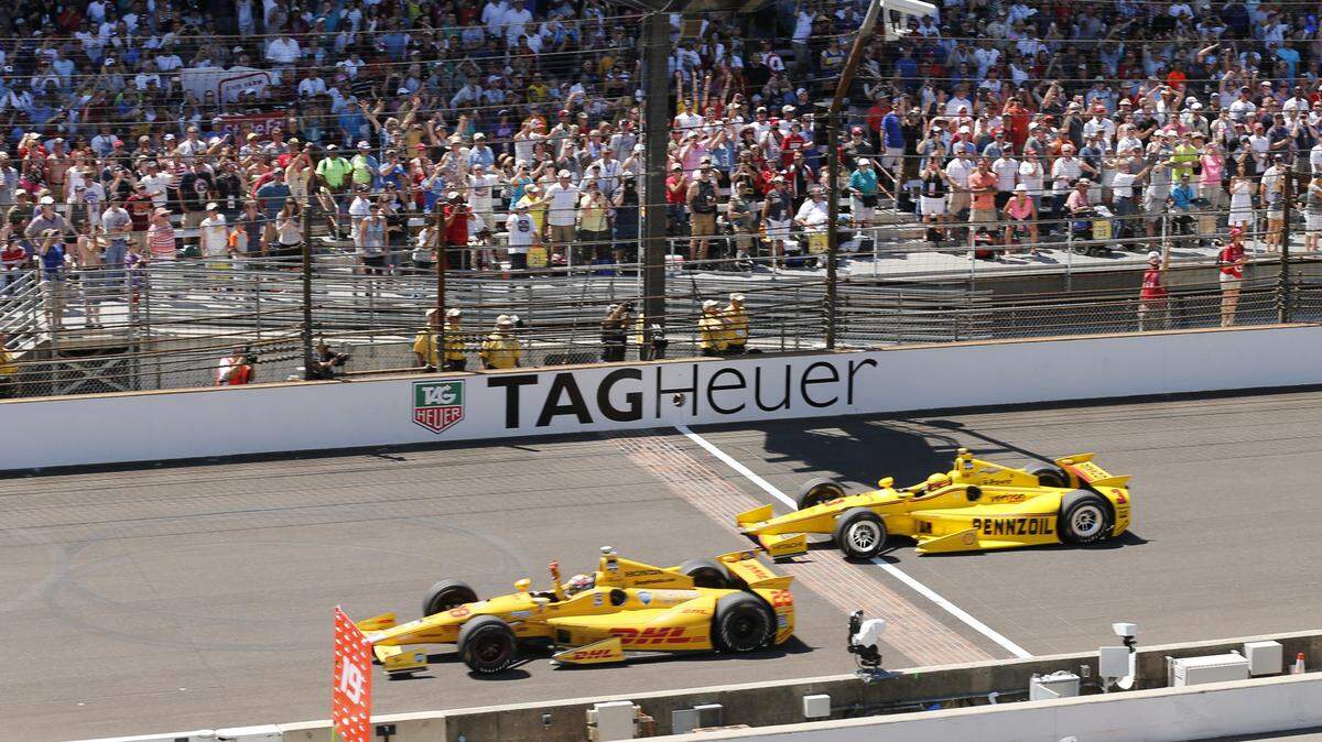 Fort Lauderdale residents Ryan Hunter-Reay in front and Helio Castroneves in second at the finish of the 2014 Indianapolis 500, one of the best Indy 500s in the race's 101-event history.