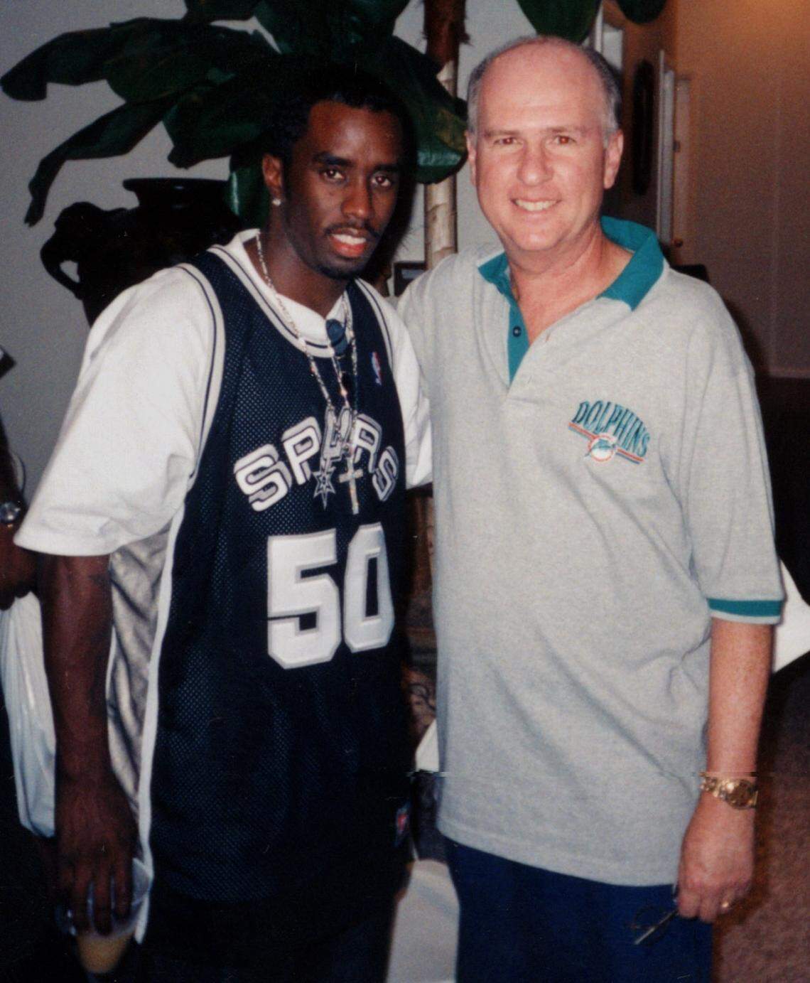 In 1999, Sean “Puff Daddy” Combs poses with businessman Jimmy Resnick.