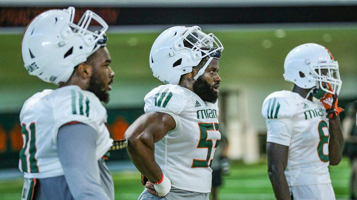 Miami Hurricanes defensive lineman Zach McCloud (53) watches fellow players run drills during practice at the University of Miamis Carol Soffer Indoor Practice Facility in Coral Gables on Tuesday, August 10, 2021.