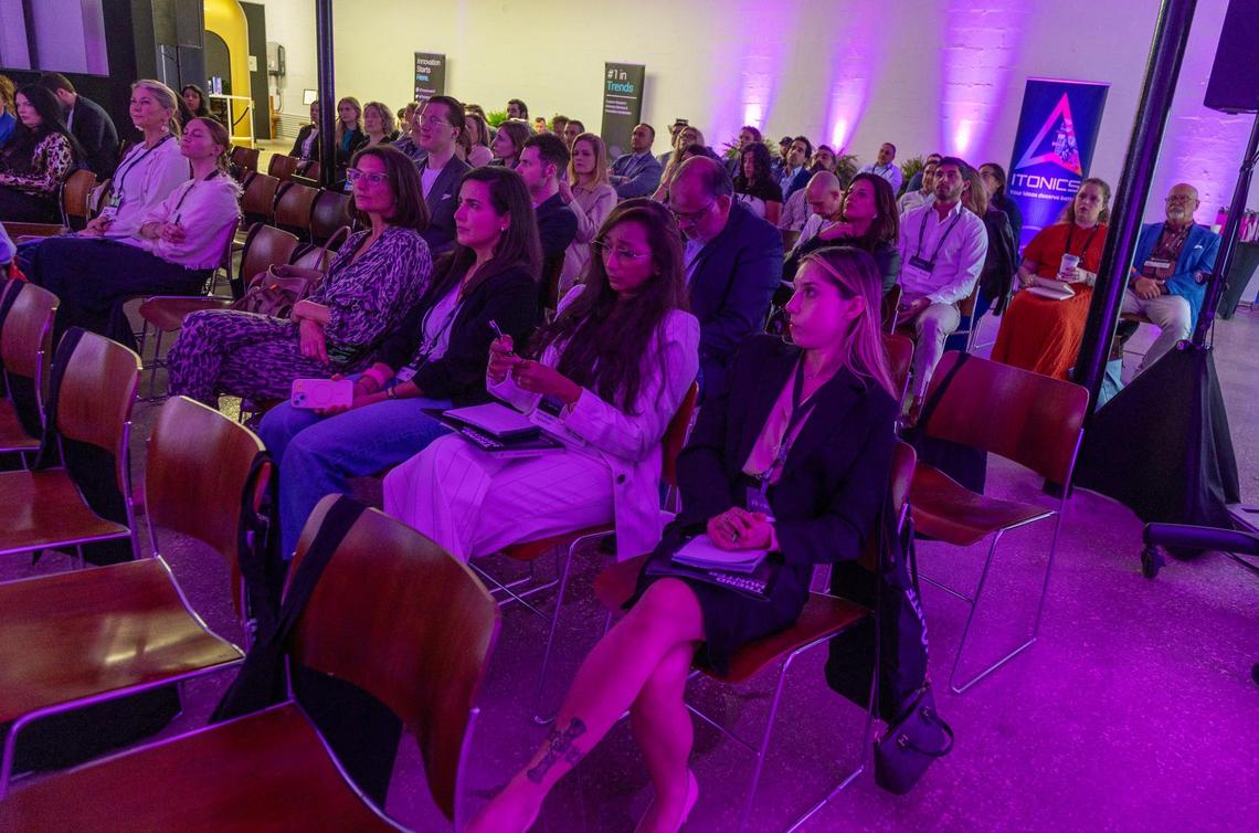 Attendees listen as Innovation Keynote Speaker Jeremy Gutsche, CEO of Trend Hunter AI, speaks during the Future Festival Miami Innovation Conference, in Miami, on Tuesday, February 25, 2025.