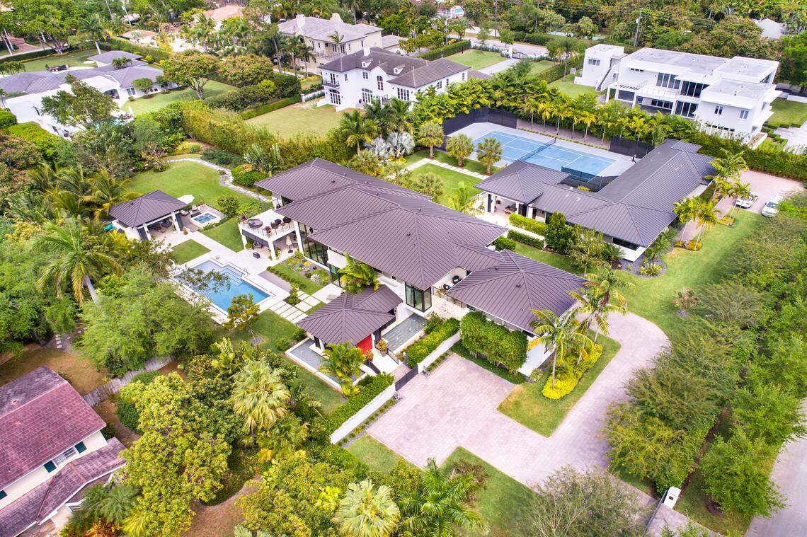 Jose E. Souto dropped $9.2 million on a single-family home, pictured above, in Unincorporated Miami-Dade. 