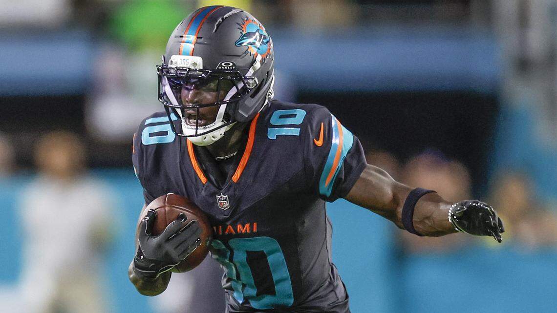 Miami Dolphins wide receiver Tyreek Hill catches a pass in the first half against the New York Jets at Hard Rock Stadium in Miami Gardens, Florida, on Monday, September 29, 2025. Hill suffered a serious knee injury during the game.  