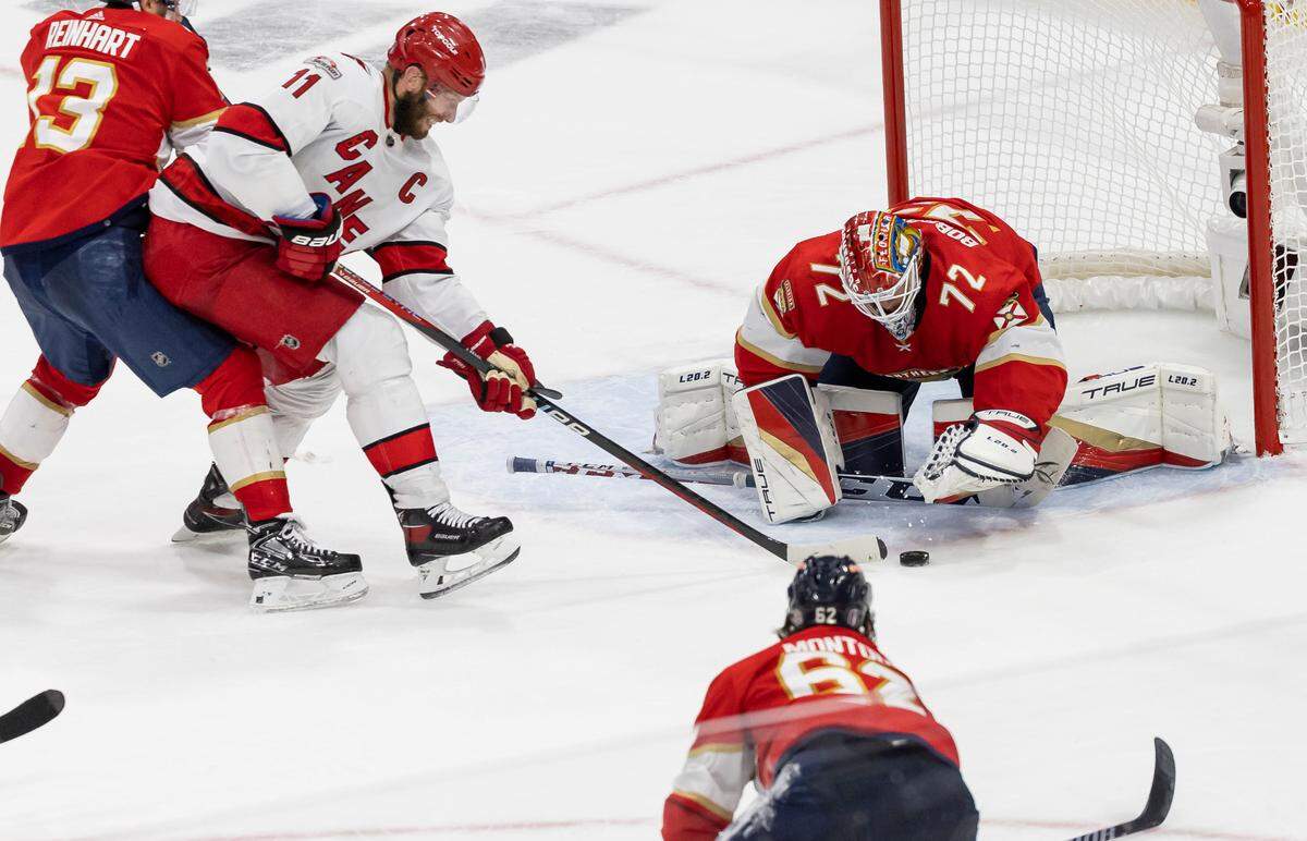 Florida Panthers goaltender Sergei Bobrovsky (72) blocks a shot from Carolina Hurricanes center Jordan Staal (11) in the third period of Game 3 of the NHL Stanley Cup Eastern Conference finals series at the FLA Live Arena on Monday, May 22, 2023 in Sunrise, Fla.