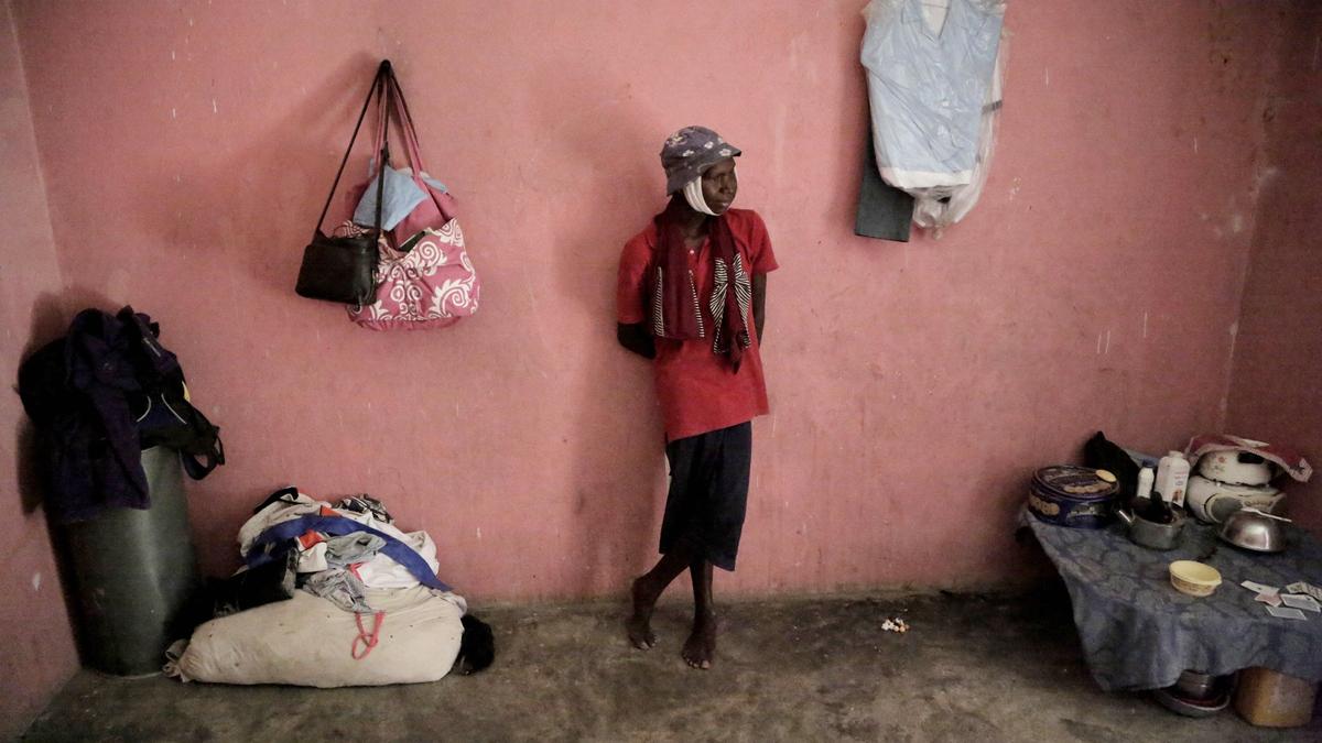 Because of his advanced Burkitt lymphoma, Djooly Jeune was kicked out of school. His 14-year-old sister was as well, his mom said, because the director feared he was contagious. He’s surrounded by his family’s meager possessions.
