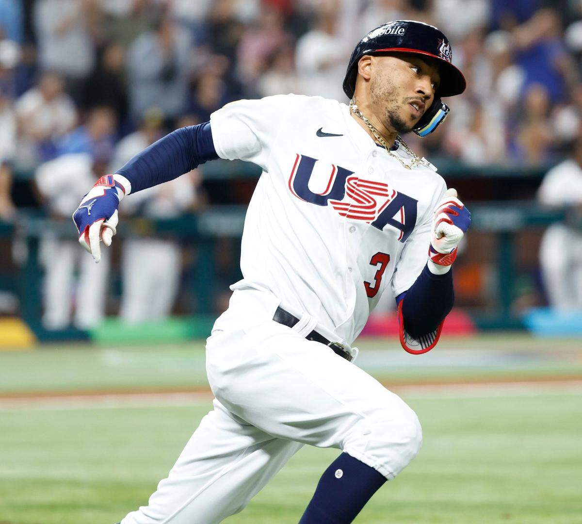 USA outfielder Mookie Betts (3) hits a double against Cuba in the first inning during the World Baseball Classic semifinal at loanDepot Park in Miami, Fla. on Sunday, March 19, 2023.