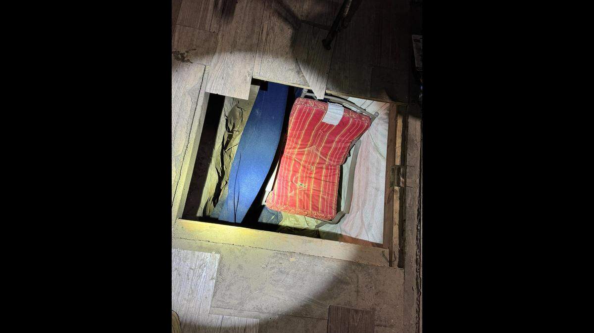 The underground hiding place was under a shed and measured at about 6-feet deep and 4-feet wide, officials said.