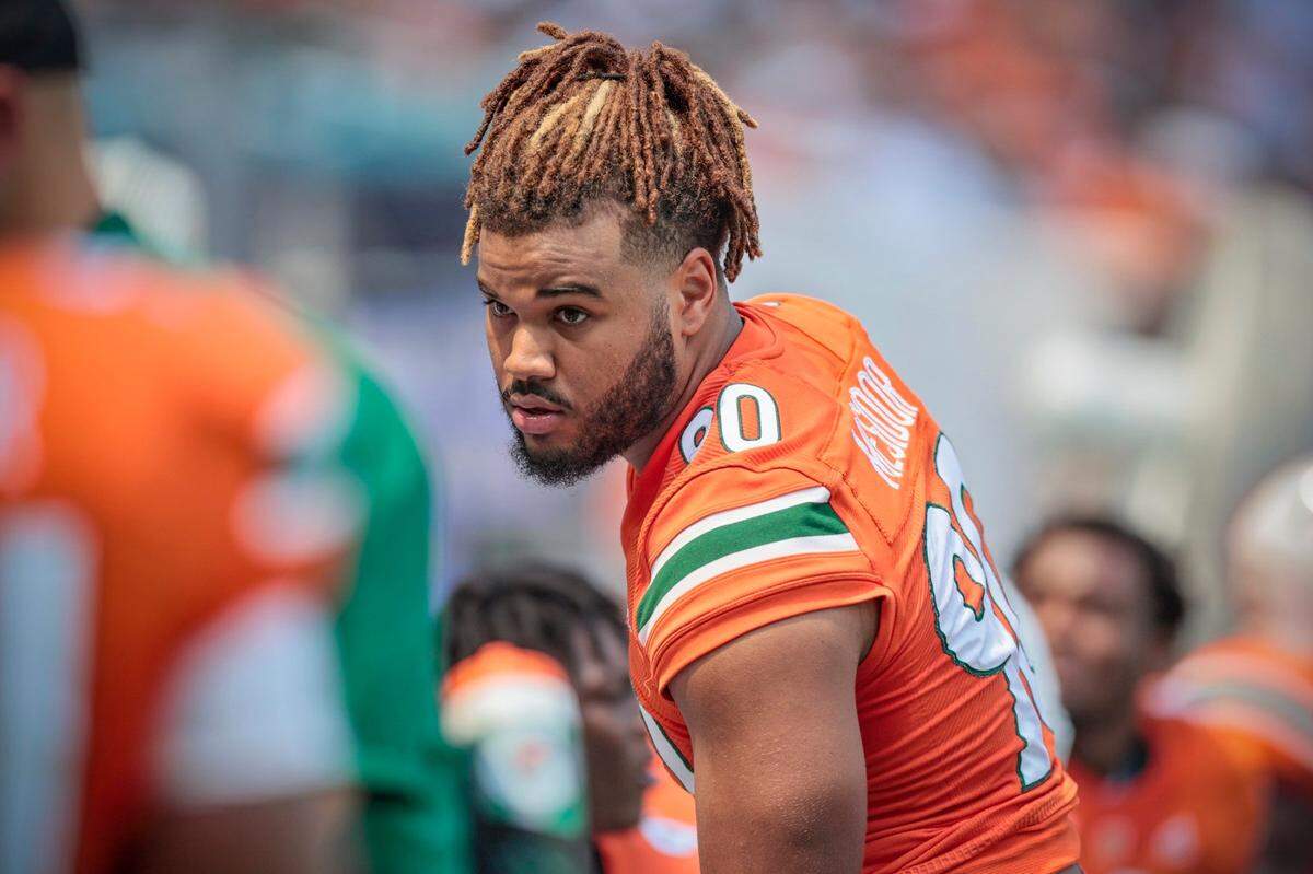 Miami Hurricanes defensive lineman Akheem Mesidor (90) sits out the game against Southern Miss Golden Eagles at Hard Rock Stadium in Miami Gardens on Saturday, September 10, 2022.