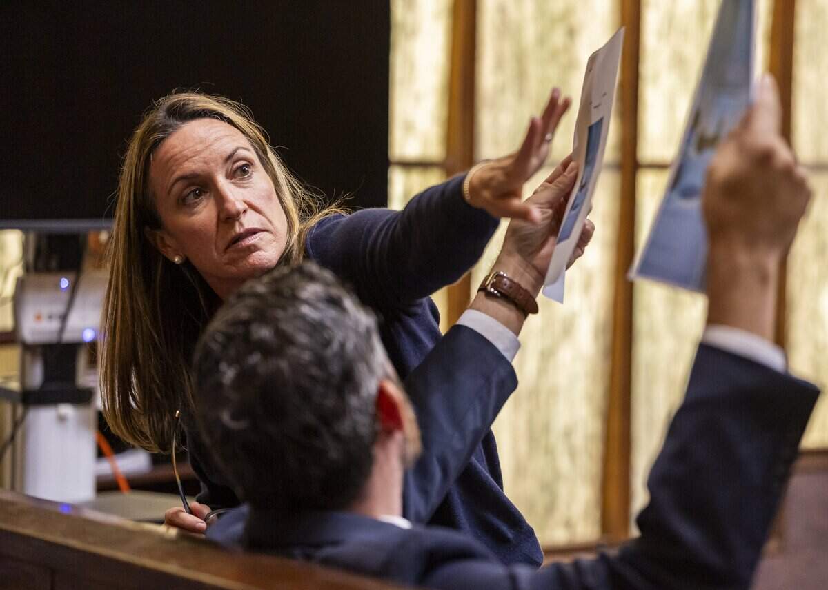 Edward Armellino holds evidence as Cecilia Pino testifies during the George Pino trial at the Richard E. Gerstein Justice Building on Tuesday, June 16, 2026, in Miami, Fla. Pino is charged in connection to the boat crash that killed 17-year-old Lucy Fernandez in 2022.