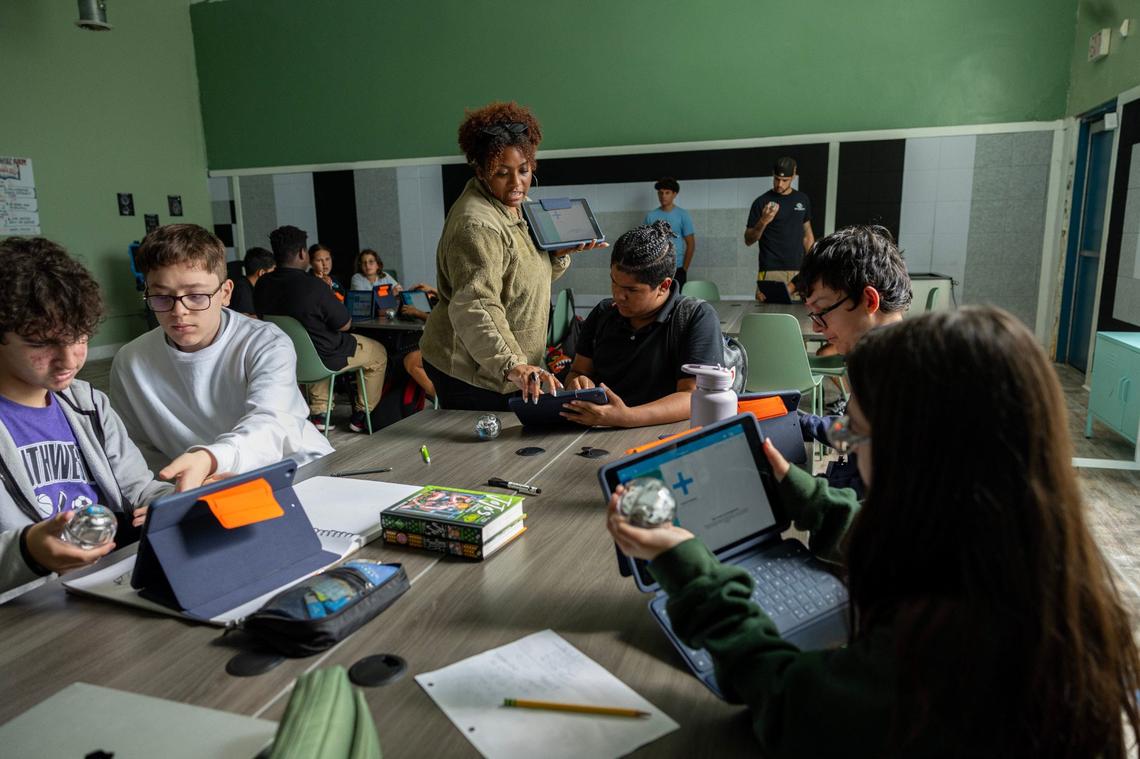 A Club Staff member explains the directions for using the Sphero BOLT+, a round programmable robot, during a STEM activity for an after school care program at Boys & Girls Clubs of Miami-Dade on Tuesday, September 17, 2024, in Miami, Fla.