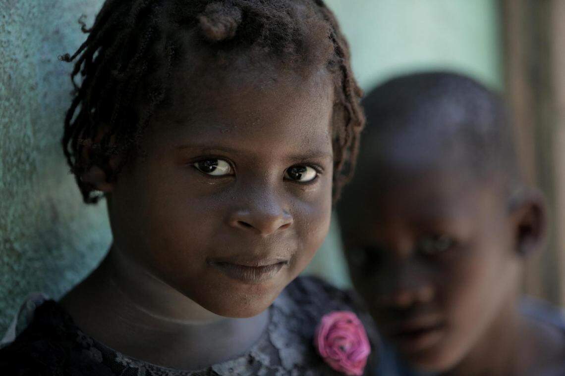 Belanger, Haiti - August 3, 2018 - Paula Paul’s daughter, six year-old Marie Stacy (left) and her little friend, four year old Lukenson are curious about visitors to their town. Paula Paul has been diagnosed with cervical cancer. She has been undergoing treatment for the disease but, due to lack of funds, has been struggling to make the trips to University Hospital in Mirebalais. She constantly worries about what will happen to her children once she is gone.