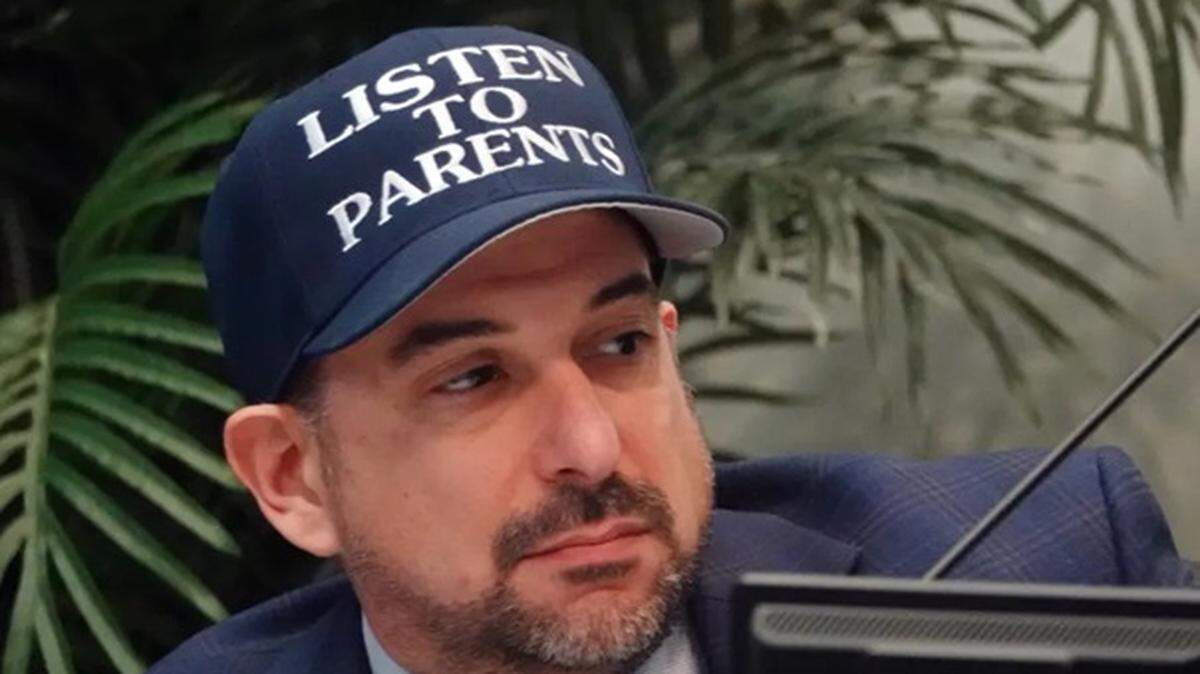 Broward County School Board member Adam Cervera listens to public comments Wednesday, Jan. 21, 2026, in Fort Lauderdale. Parents and students spoke in opposition to a money-saving measure that would move high school graduations to gymnasiums. Superintendent Howard Hepburn announced Friday the district would not use gyms for most graduations. 
