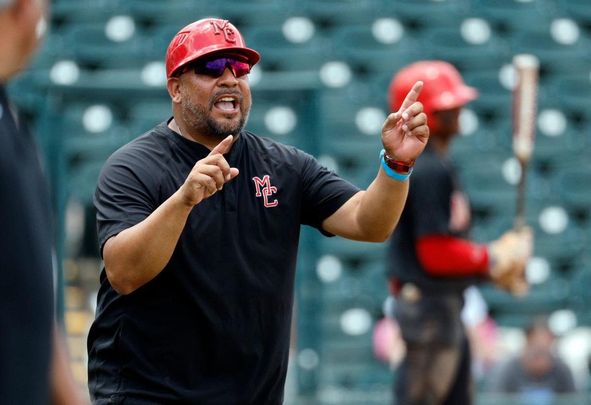 Miami Christian’s head coach Chris Cuadra calls out to players during the game against St. Johns Spartans in the FHSAA Baseball Class 2A State Final at Hammond Stadium in Fort Myers, Florida on Wednesday, May 22, 2024.