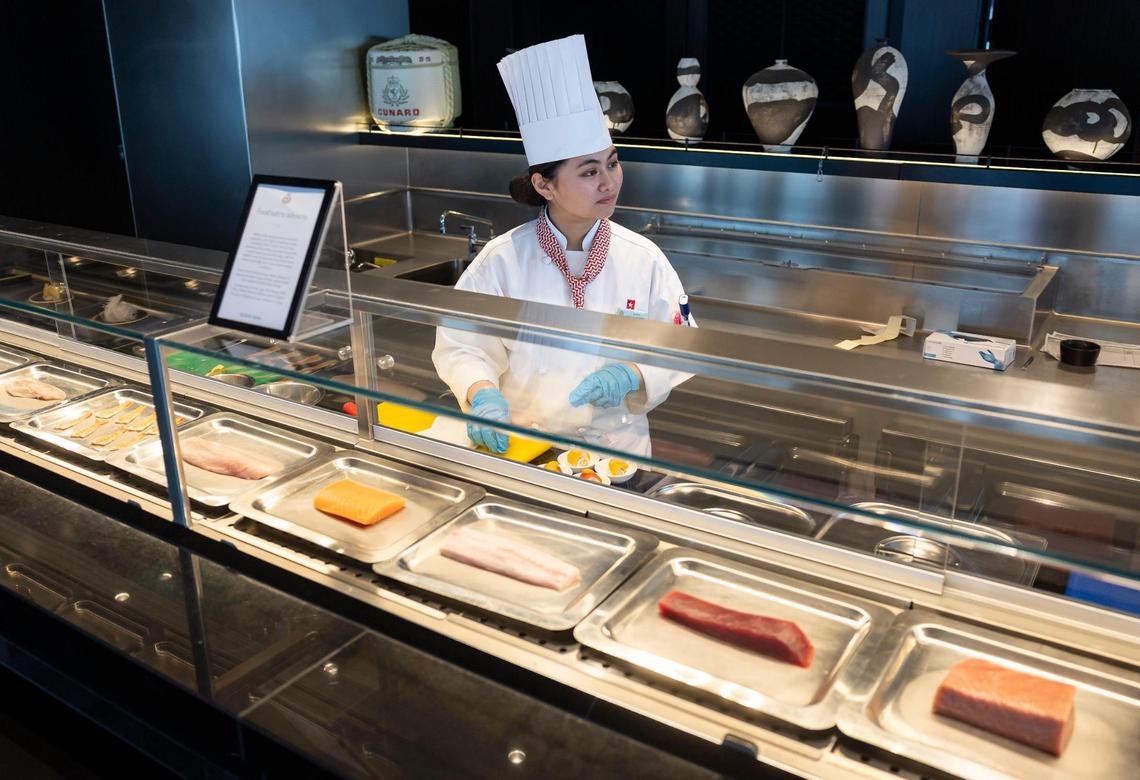 Chef Janesa Ozaki, 25, prepares sushi aboard Cunard’s Queen Anne while docked at PortMiami on Tuesday, Jan. 21, 2025, in Miami, Fla.