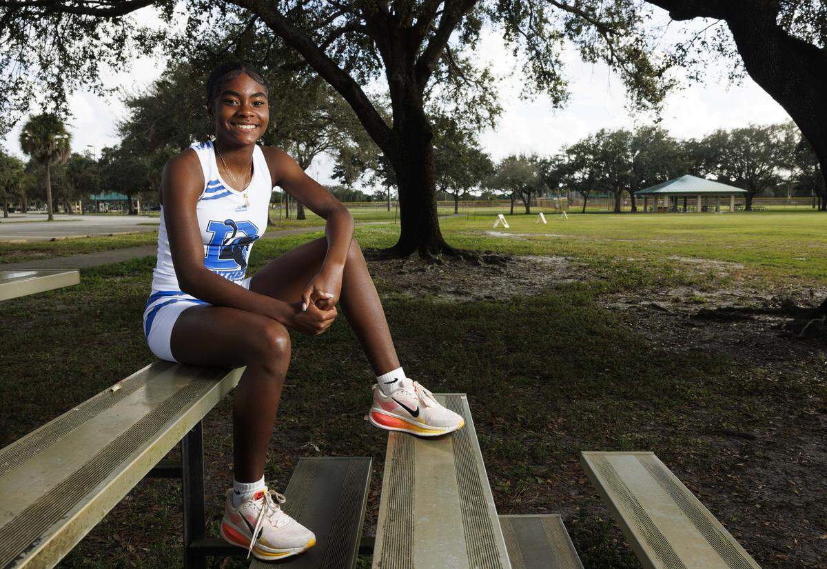 Abigail Richards, from Dillard high school and Broward county girls cross country runner of the year, poses during a Players of the Year photoshoot on Thursday, Dec. 18, 2025, at Brian Piccolo Park in Hollywood, Fla.