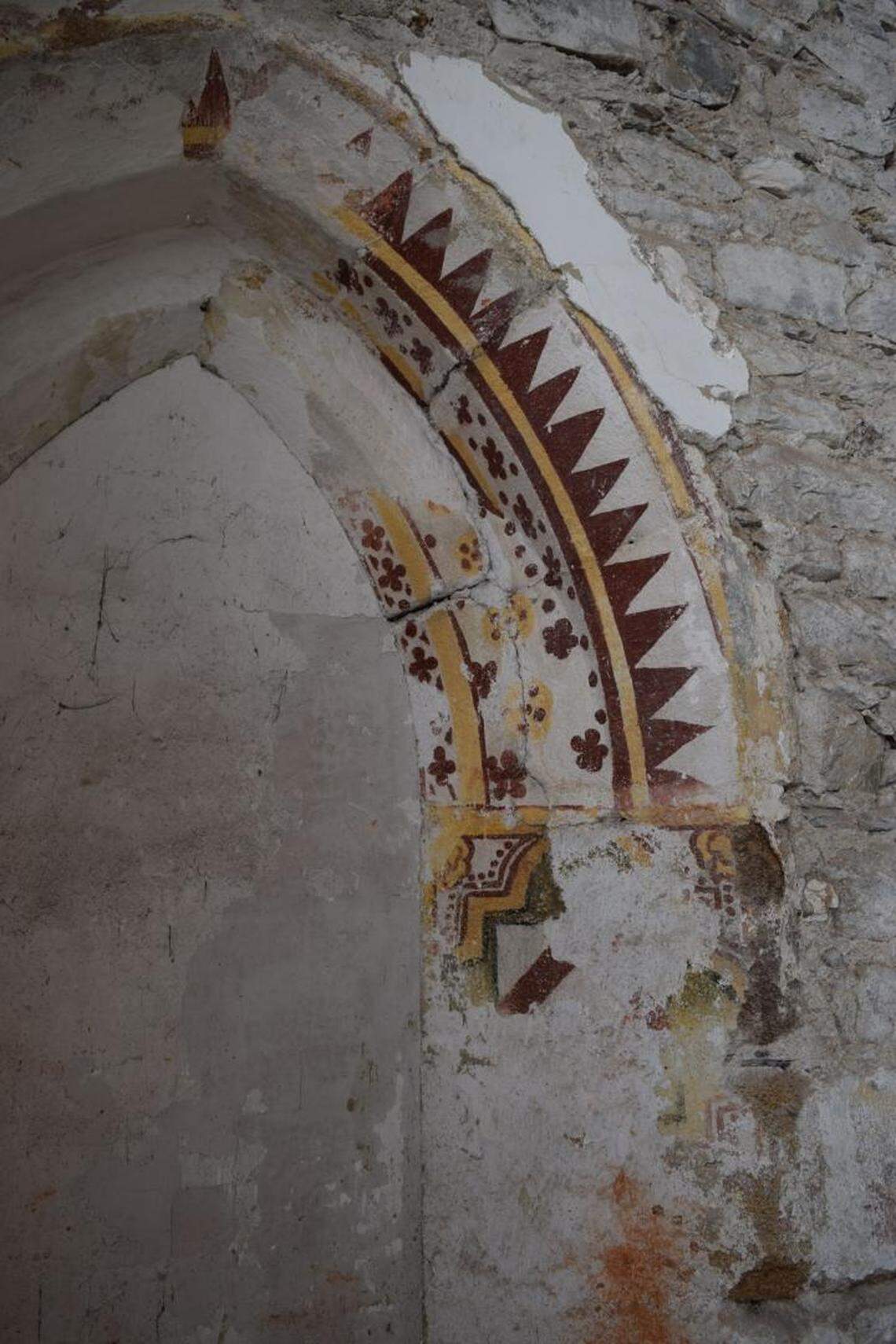 In the 13th-century section of the church, decorative arches were uncovered.