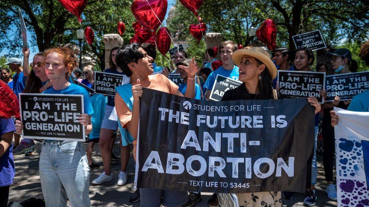 Young people march in support of anti-abortion legislation.