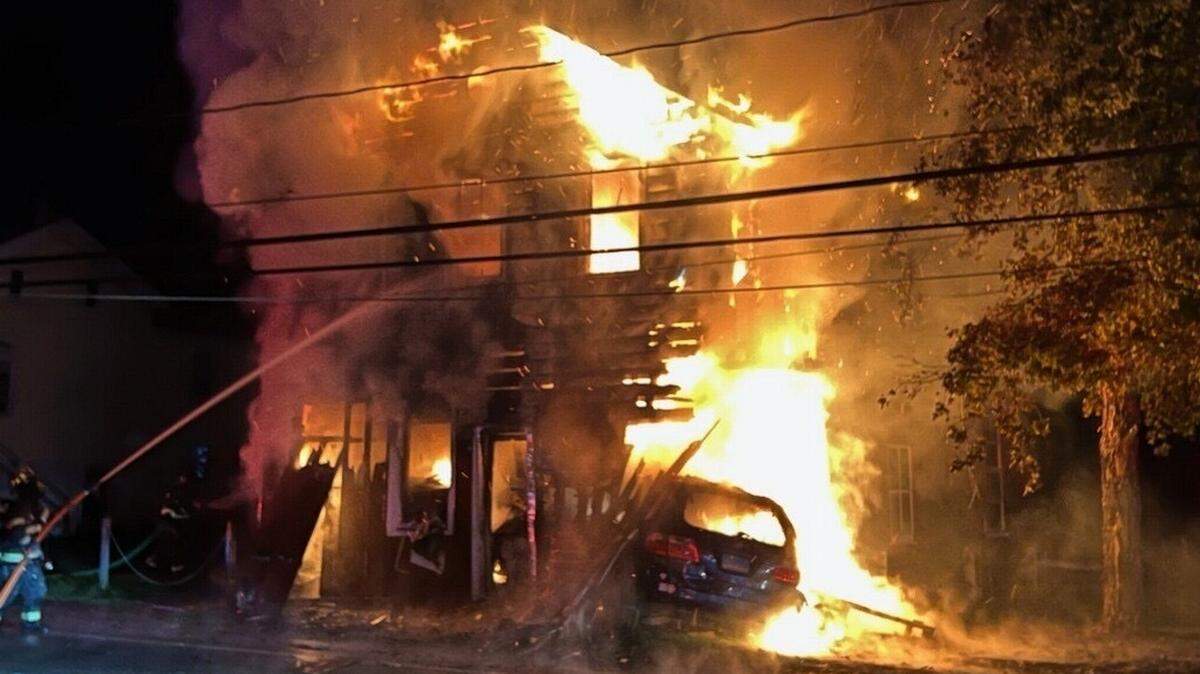 A 17-year-old driver was pulled from a burning barn after crashing their Honda into the building, New York state police say.